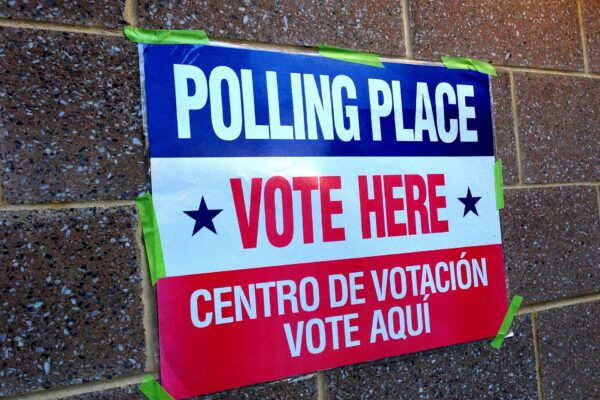 A 'Vote Here' sign at a polling place
