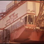 Large industrial dragline machine with stairs and cab at the Navajo coal mine, 1972