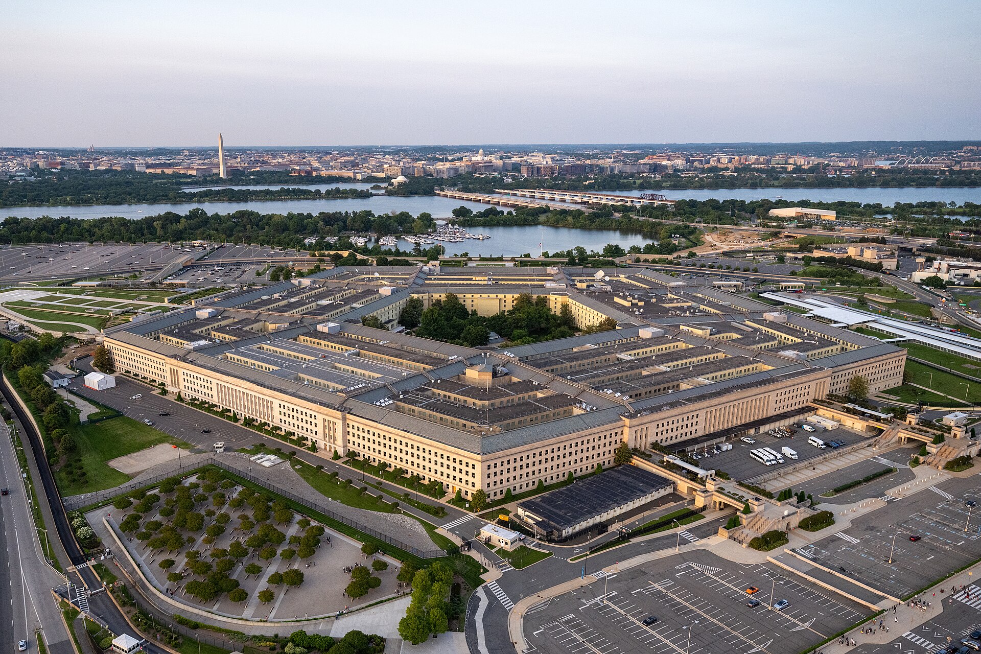 Aerial photograph of the five-sided Pentagon building and surrounding parking lots