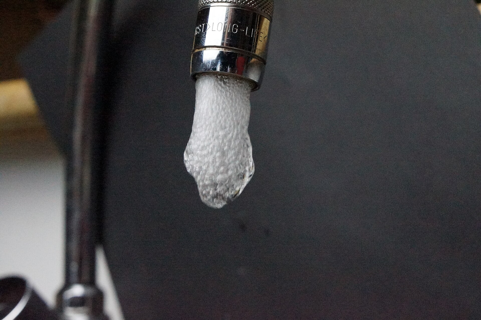 Water running from a kitchen faucet
