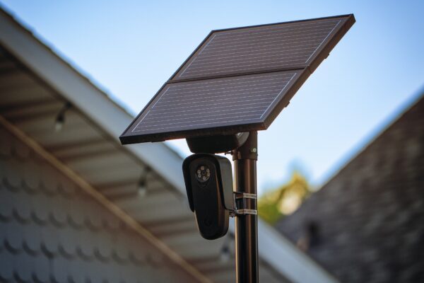 Solar-powered Flock Safety license plate reader camera mounted on a pole