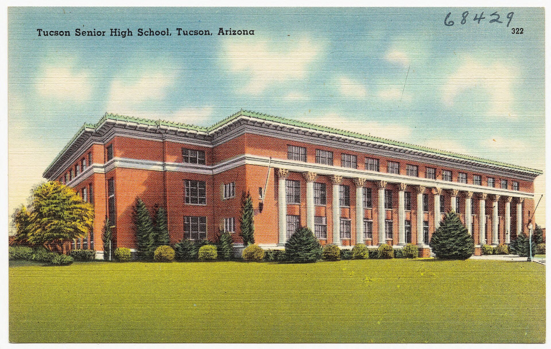 Vintage color postcard of a large red-brick, columned high school building in Tucson