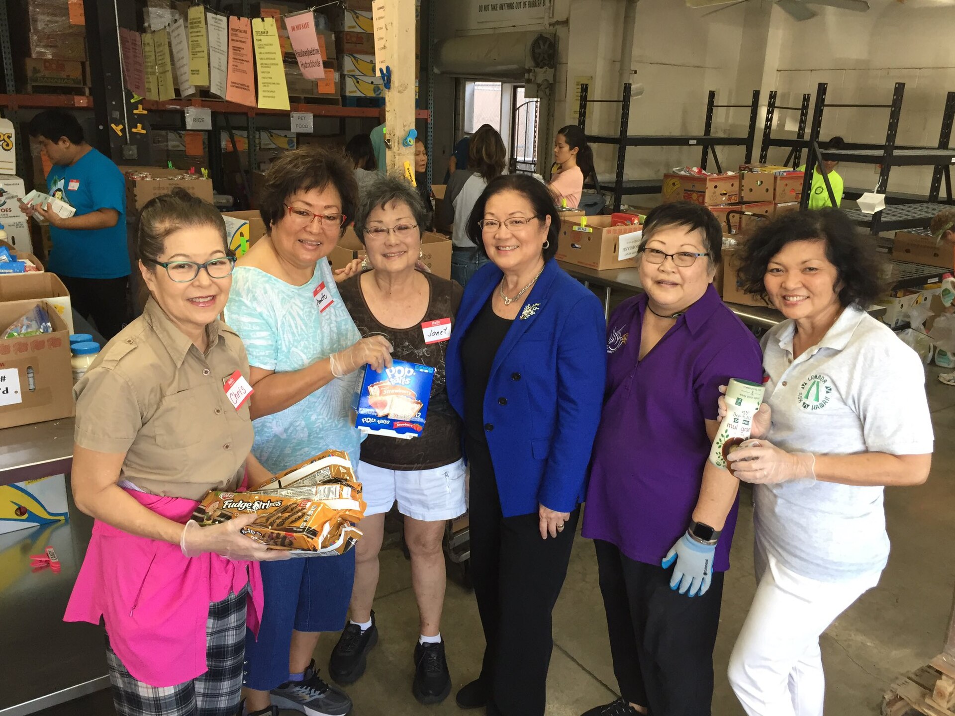 Food bank volunteers sorting donations